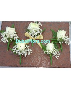 Boutonnieres with white rose and Gypsophilia
