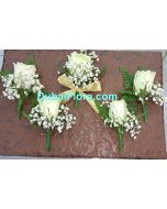 Boutonnieres with white rose and Gypsophilia